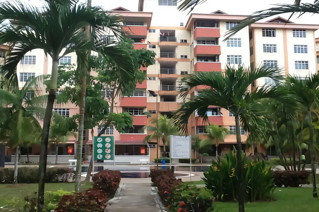 Green jogging trail surrounded by trees